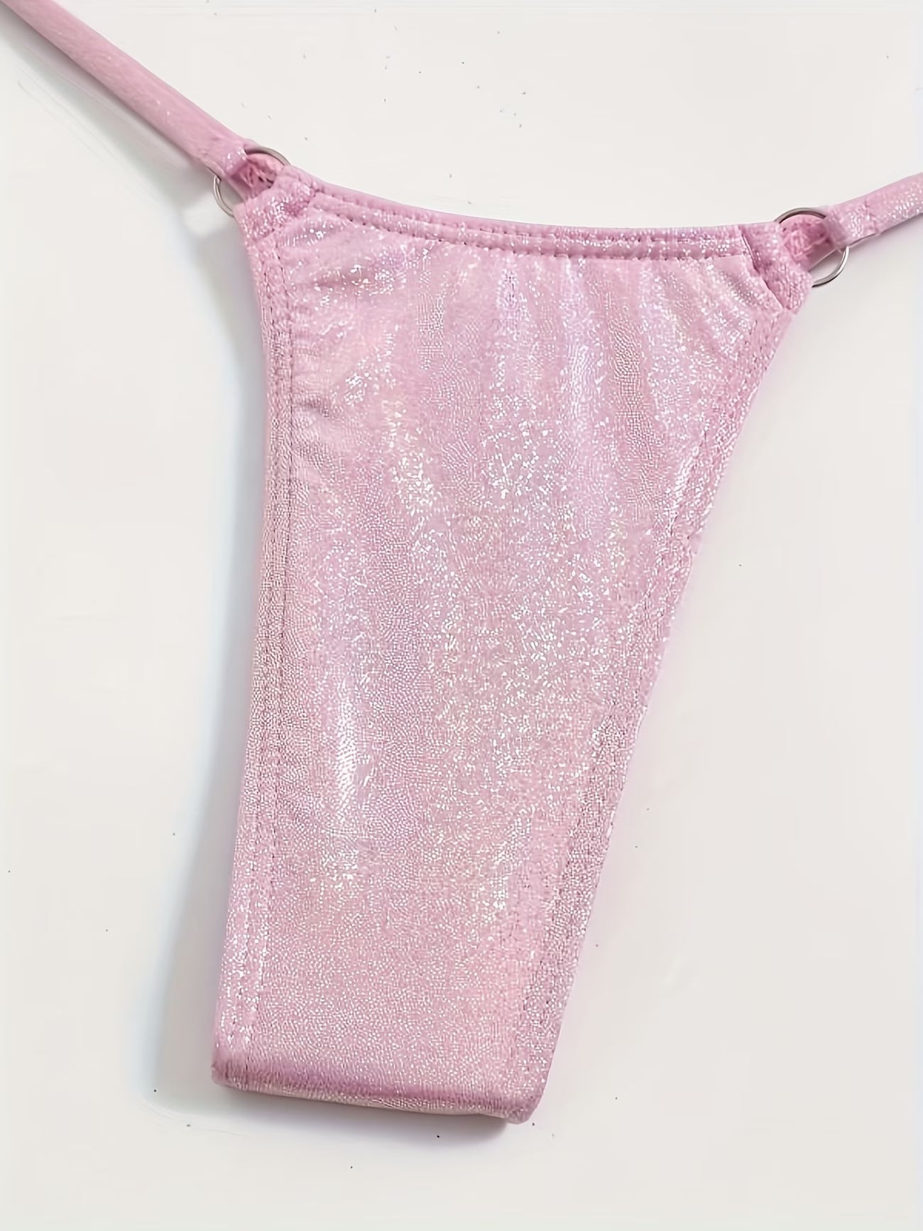 Pink glitter thong on a BIKINISEXZY stretchy knit bikini for summer vacation