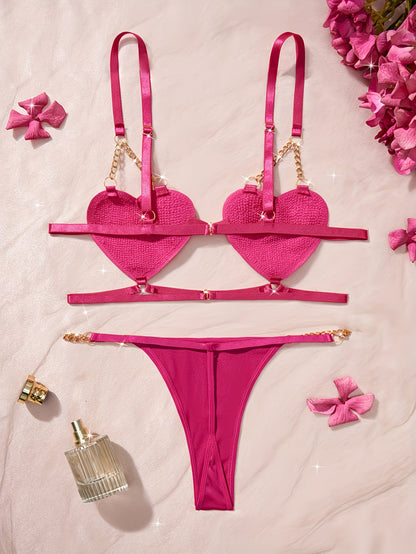 Bikinisexzy hot pink 2-piece heart chain lingerie set – bra with fluffy heart cups and matching thong flatlay
