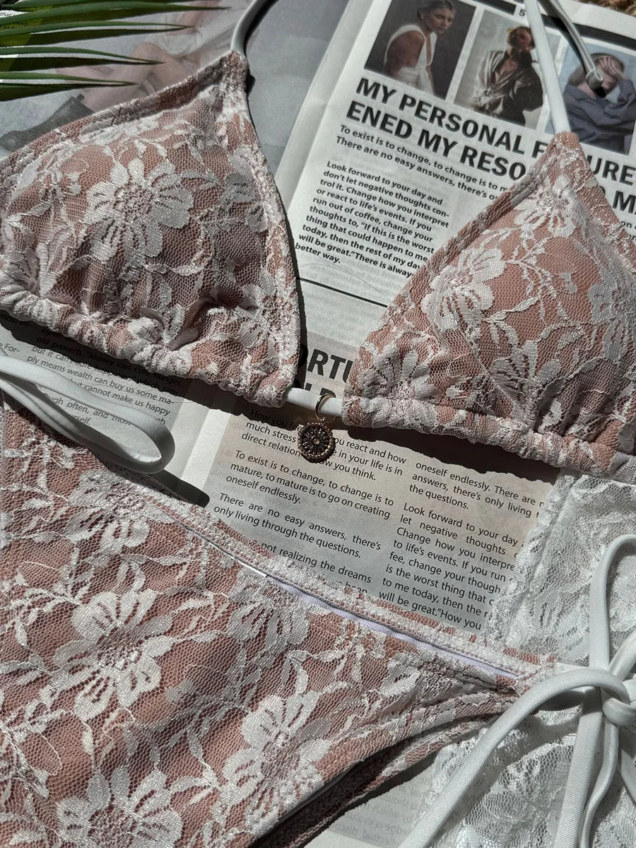 Lace bikinisexzy bikini set on a newspaper with a blurred background 