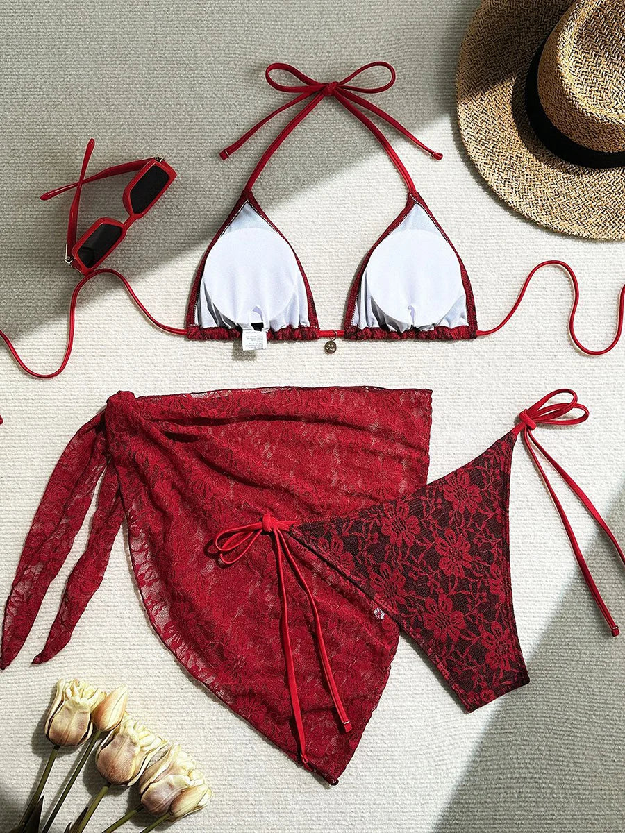 High quality BIKINISEXZY spandex polyester bikini set Red and white bikini set with matching sarong, sunglasses, and straw hat on a neutral background.