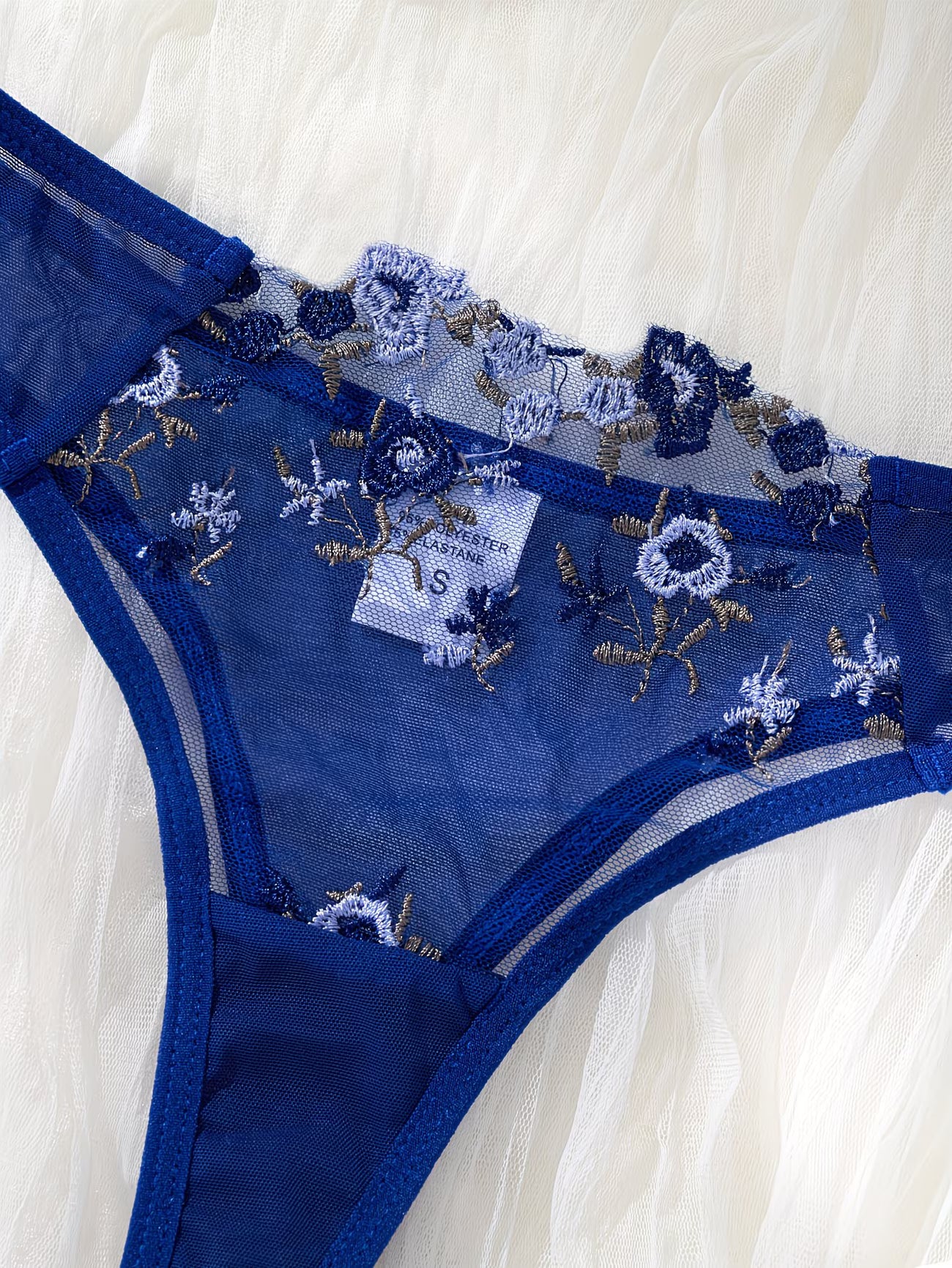 Detail view of blue floral embroidered mesh thong panty – Bikinisexzy