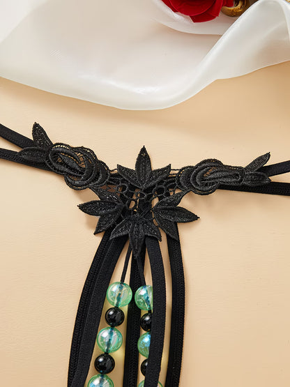 Side strap and embroidered rose butterfly lace appliqué detail of black luminous bead thong – Bikinisexzy