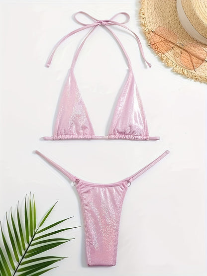Pink bikini set with a straw hat and BIKINISEXZY comfortable halter neck swimsuit design leaves on a white background 
