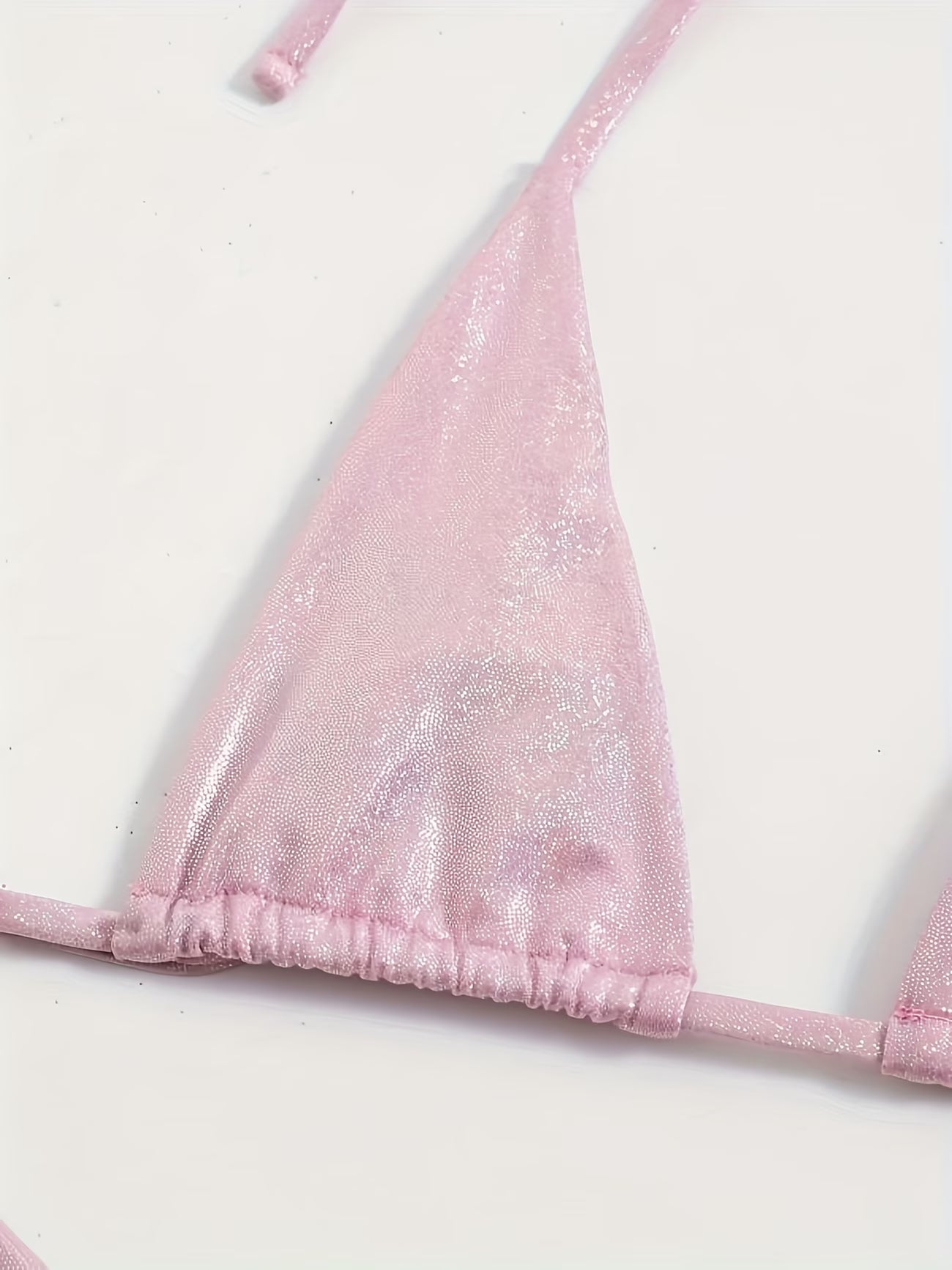 Pink glittery bikini top on a white background, BIKINISEXZY fashionable solid color beachwear