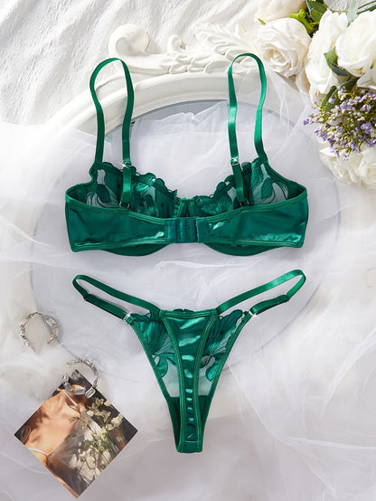 Close-up of green embroidered lily underwire bra detail – semi-sheer lace fabric by bikinisexzy