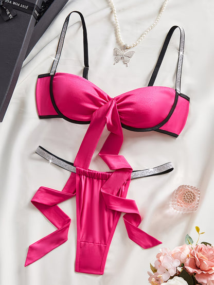 Bikinisexzy hot pink satin bow tie bra set with rhinestone waistband thong front view flat lay
