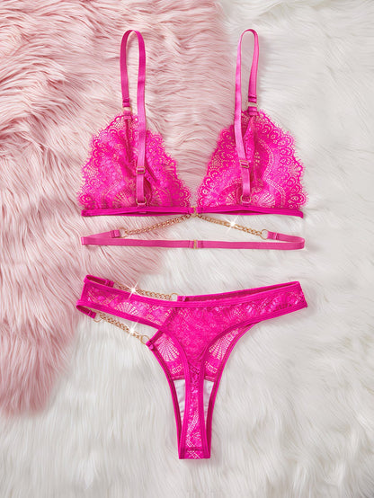 Hot pink lace bra and thong set with gold chain detail flat lay – Bikinisexzy