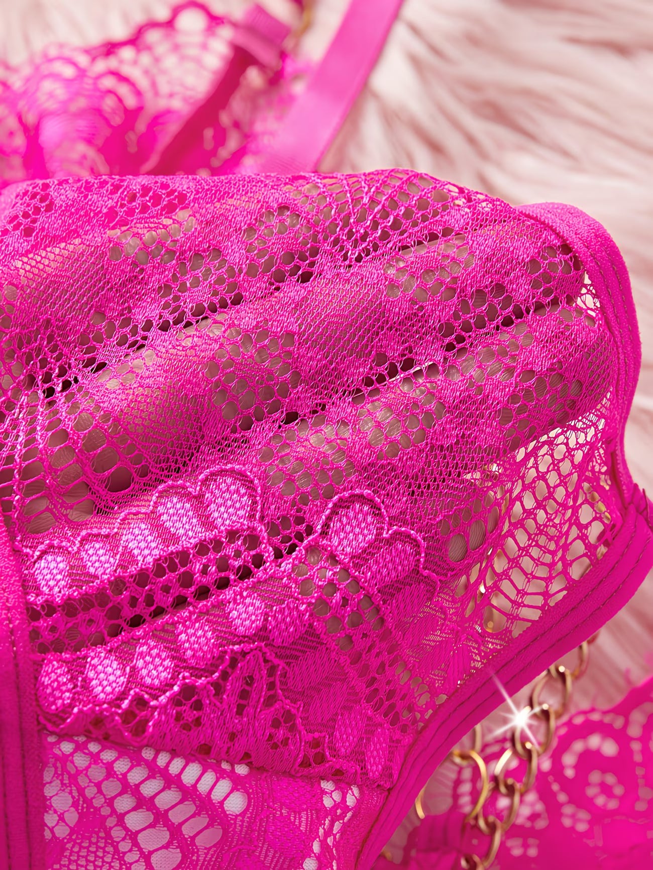 Macro detail of hot pink floral lace fabric on thong – Bikinisexzy lingerie set
