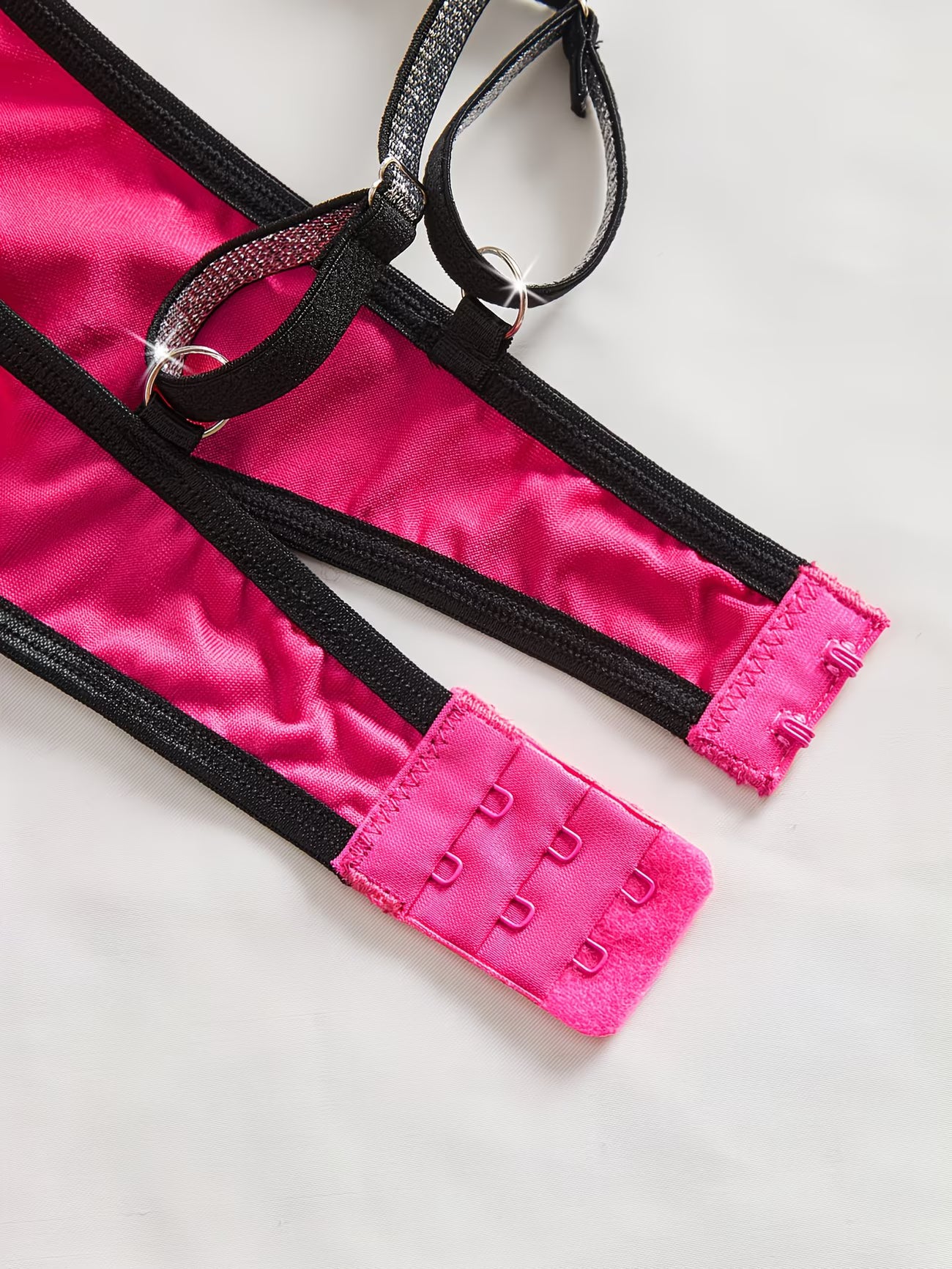 Bikinisexzy hot pink bow tie lingerie set worn on model showing full front view with rhinestone straps and thong
