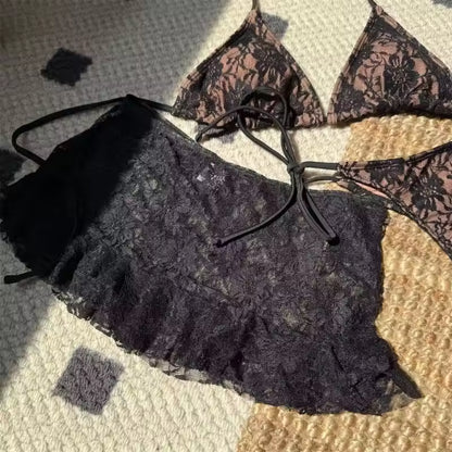 Lace lingerie set on a textured surface BIKINISEXZY sexy 3-piece hollow-out tankini set front view