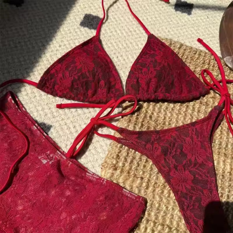 Red lace bikini set on a textured surface BIKINISEXZY sexy 3-piece hollow-out tankini set front view