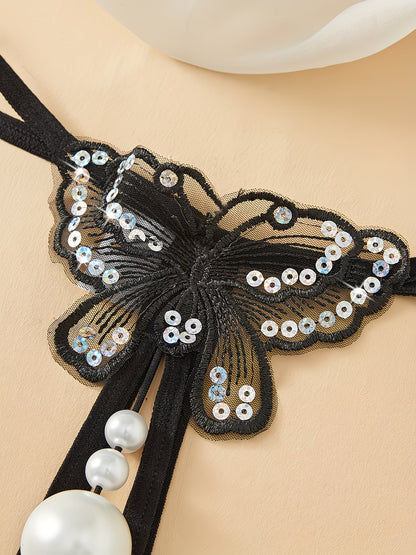 Close-up of extra-large pearl massage beads on black thong lingerie | Bikinisexzy
