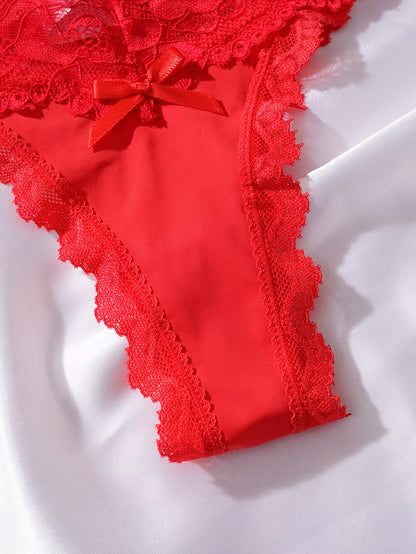 Bikinisexzy Red Lace Low-Waist Thong Panties with Bow – Front View on Satin