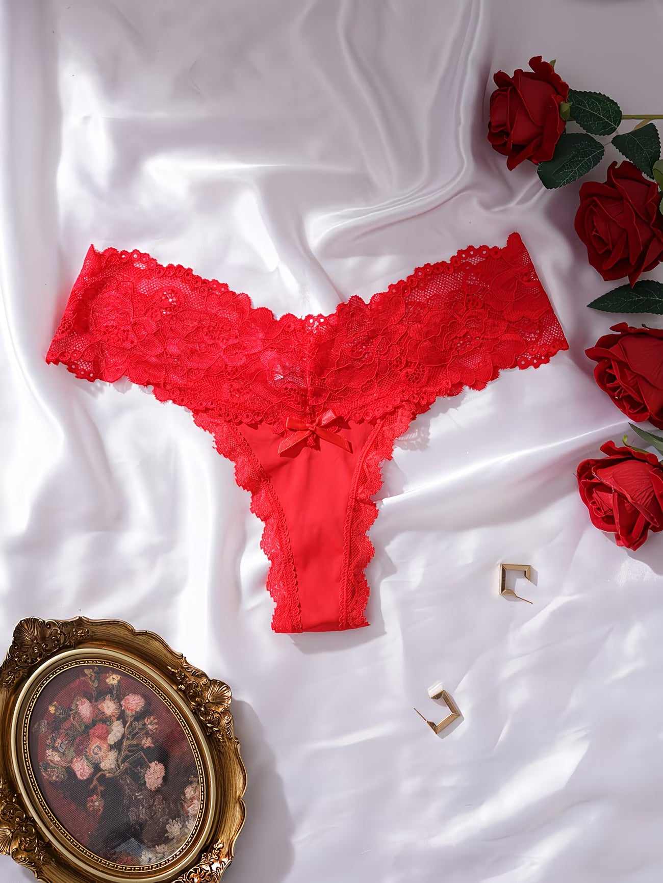 Bikinisexzy Red Lace Thong Panties with Bow – Flat Lay with Red Roses