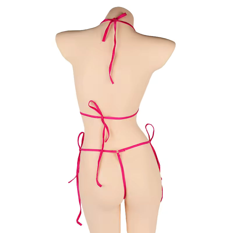 Model wearing a vibrant red and white Bikinisexzy cut-out bikini.