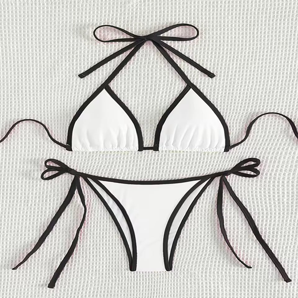 White bikini with black straps on a light gray background.BIKINISEXZY tie on side sexy beach bikini set