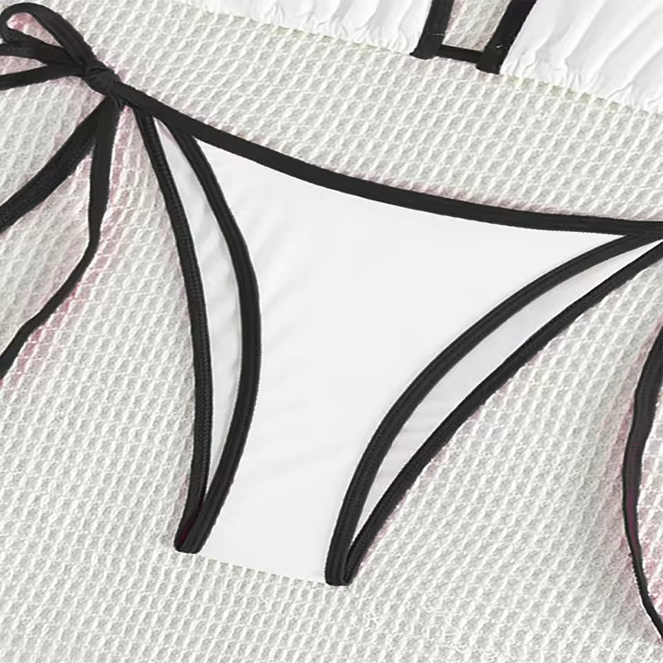 Black bikini bottom on a textured white surface high quality BIKINISEXZY tie on side sexy beach bikini set