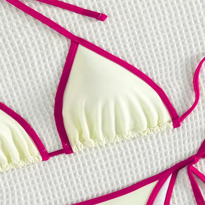 White bikini top with pink straps on a textured white background. BIKINISEXZY low waist brazilian biquini swimwear