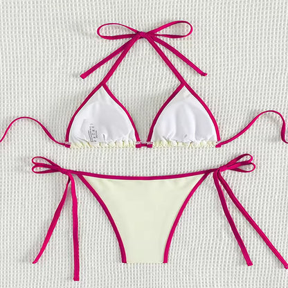 White bikini with pink straps on a textured white background. BIKINISEXZY low waist brazilian biquini swimwear