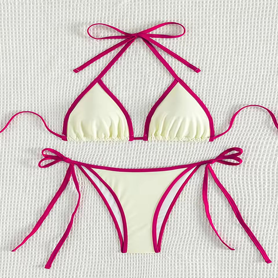 White bikini with pink straps on a textured white background.BIKINISEXZY low waist brazilian biquini swimwear