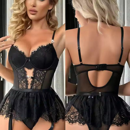 Seductive see-through lace bodysuit featuring intricate strap details at Bikinisexzy.com